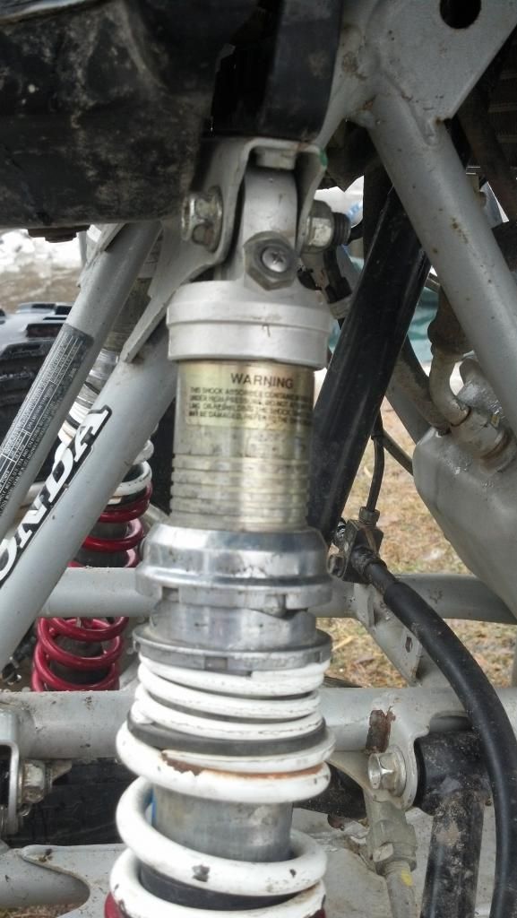 how to i adjust my shocks? Honda ATV Forum