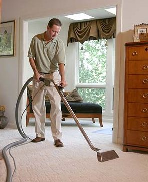 man carpet cleaning