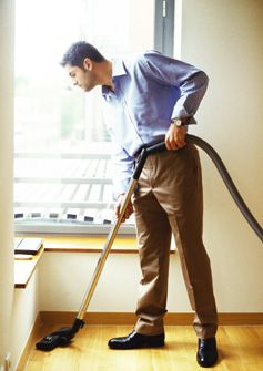 man vacuuming