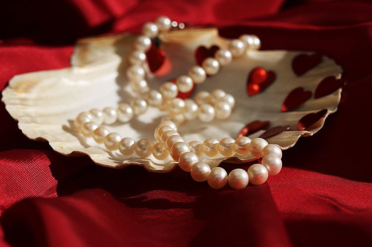 red cloth and pearls