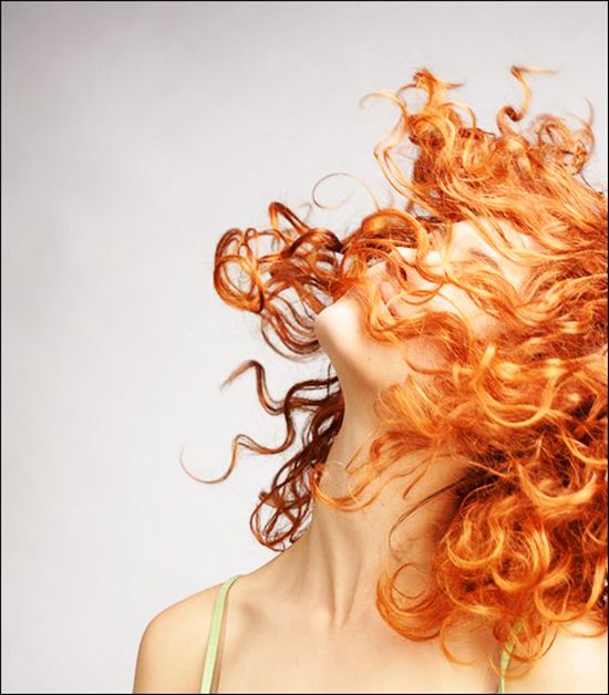 redhead with curls everywhere