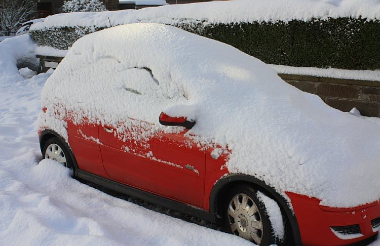 red car in snow