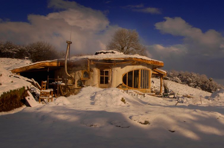 Low Impact Woodland Home in the snow