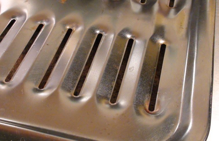 the top part of a grilling pan