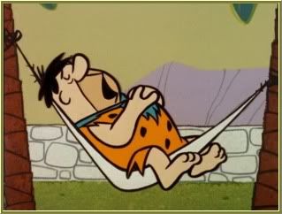 Fred Flintstone sleeping and snoring